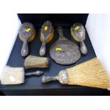 6 ASSORTED SILVER BRUSHES AND A SILVER MIRROR