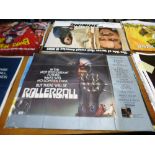 9 ASSORTED FILM POSTERS - ROLLERBALL, 3X JAMES BOND A VIEW TO A KILL, METEOR, EXCALIBUR, TIME