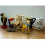 4 WHISKEY JUGS INCLUDING GUINNESS TOUCAN, BULMERS CIDER FIGURE, BABY CHAM FIGURE AND A BOTTLE