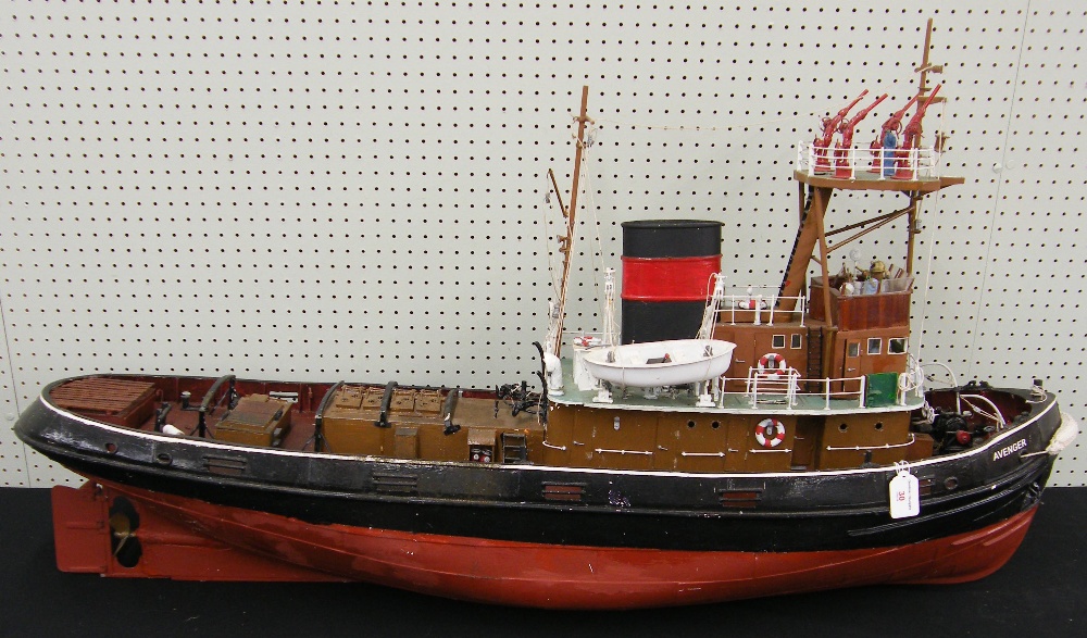 Motorised scale model of a fire-fighting ship, named 'Avenger, London', 24" high, 48" long