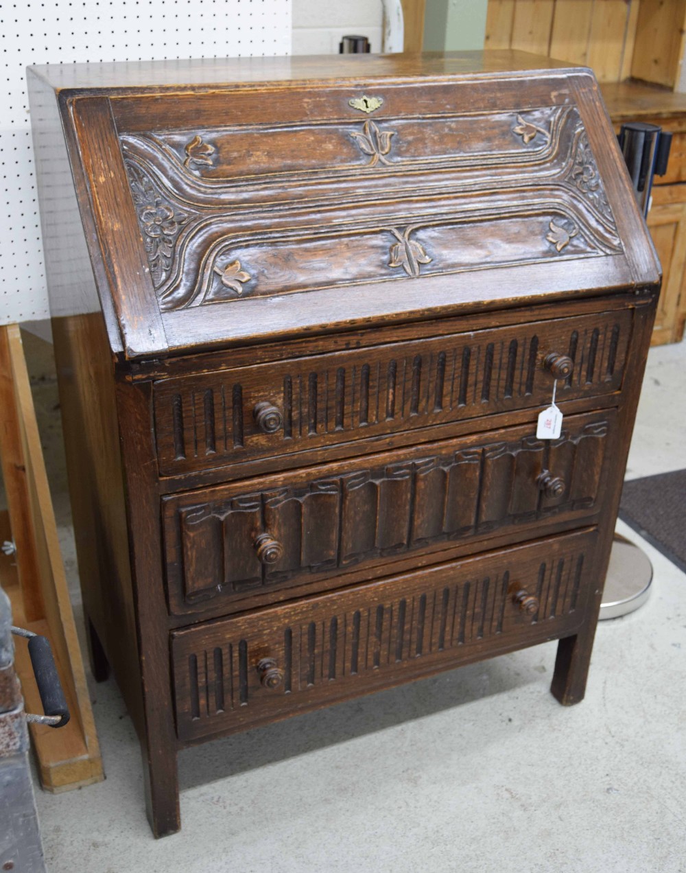 Arts and Crafts style oak bureau with fitted pigeon hole interior, 40" high, 30" wide, 16" deep