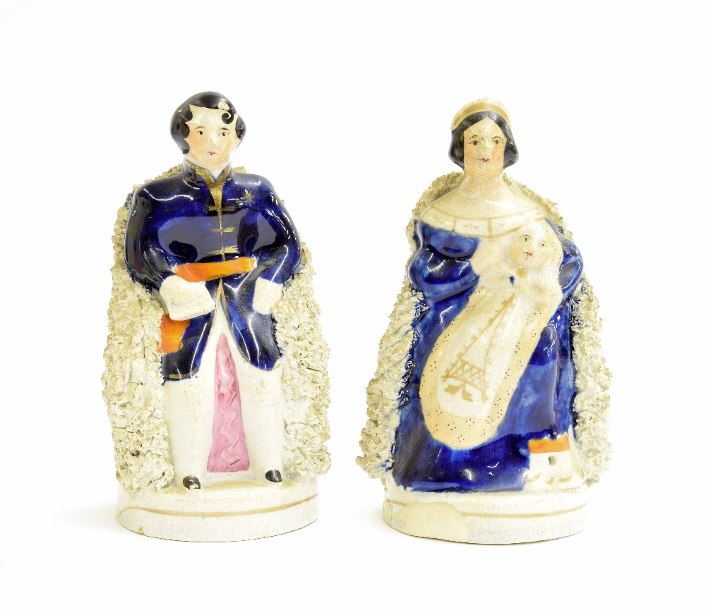 Staffordshire porcelain figures modelled as Victoria and Albert, 5.5" high approx (2)