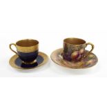 Royal Worcester porcelain cabinet cup and saucer painted with fruits and gilded highlights, signed