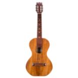 1958 Thomas Carey small bodied guitar of walnut construction, soft bag