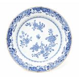 Chinese blue and white porcelain charger, with flowers to centre within a floral border, 18th