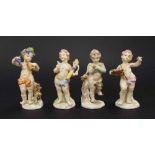 Set of four Rudolstadt German porcelain figures depicting cherubs, each 4.75" high (4)