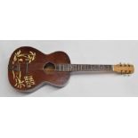 Small bodied guitar with Hawaiian style decoration