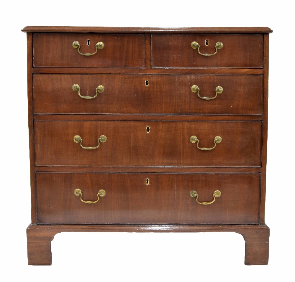 George III mahogany chest of drawers, with two short over three graduated long drawers upon