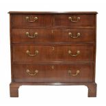 George III mahogany chest of drawers, with two short over three graduated long drawers upon