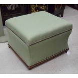 Victorian square green upholstered ottoman, hinged lid around a mahogany frame on four ball feet,