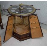 Interesting nautical inspired instrument/drinks cabinet, with ships wheel and glass top over