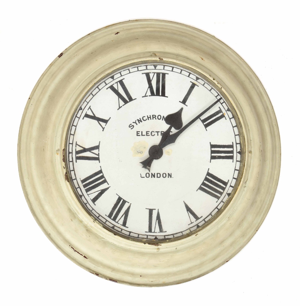 Early Synchronome electric 12" wall dial slave clock, within a painted enamel surround