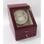 Automatic dual watch winder display case, with glazed hinged lid and cream leather interior with