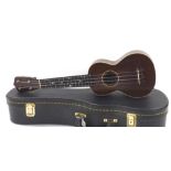 1940s Gibson Uke-1 soprano ukulele of mahogany construction, repairs to sides, contemporary hard