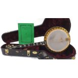 Fine Vega Artist banjo, with highly flamed and chevron banded mahogany and maple resonator,