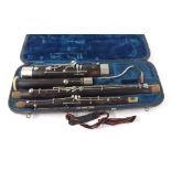 Old unnamed bassoon with nickel keys and ferrules, with crook, fitted case