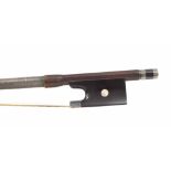 Silver mounted violoncello bow, unstamped, the stick round, the ebony frog inlaid with pearl eyes