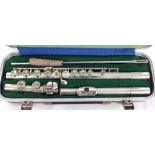 Metal flute by and stamped 'Romilly' Graduate Made for Rudall Carte & Co Limited, London, case