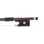 Gold mounted violin bow, unstamped, the stick octagonal, the ebony frog inlaid with gold rings