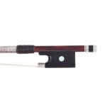 Interesting silver mounted violin bow stamped C. Thomassin á Paris, the stick round, the ebony