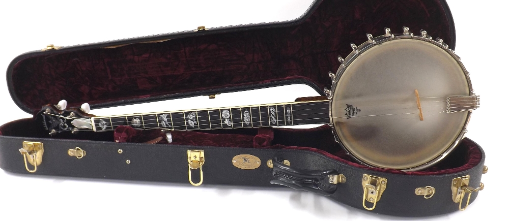 Good Wildwood five string banjo, with chevron and bone banded wooden resonator, with intricate