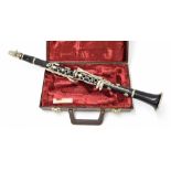 F. Buisson rosewood and nickel mounted clarinet, case