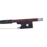 Silver mounted violin bow stamped J. Brown JNR, the stick round, the ebony frog inlaid with pearl