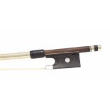 Silver mounted violin bow, unstamped, the stick round, the later ebony frog inlaid with pearl eyes