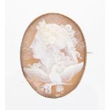 Victorian 9ct oval cameo portrait brooch carved in relief with a profile portrait of a young