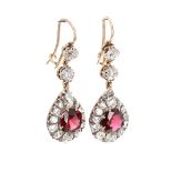 Fine pair of gold garnet and diamond cluster drop earrings, each set with single garnets and fifteen