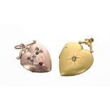 Two gold heart shape diamond set locket pendants, one 15ct and the other 9ct, 11.1gm, the larger