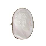 Oval helmet shell cameo brooch carved with the profile portrait of a Roman head, 50mm x 34mm, within