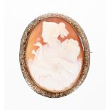 Oval cameo carved with a lady holding a peacock, within a gilded metal surround, 47mm x 35mm