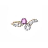 18k ruby and old-cut diamond cross-over design ring with diamond set shoulders, 2.1gm, ring size L
