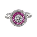 Attractive platinum ruby and diamond halo ring, the centre diamond 0.41ct approx, clarity VS1-2,