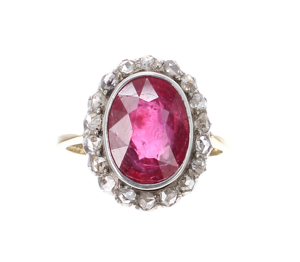 18k ruby and mine-cut diamond oval cluster ring, the ruby 4ct approx, cluster 17mm x 14mm, 5gm, ring