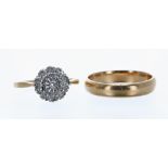 18ct illusion set diamond cluster ring within a stepped floral white metal setting, 3.9gm, ring size