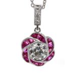 Fine 18k white gold ruby and diamond pendant on trace chain, the principle round brilliant-cut