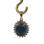 Cabouchon black opal and diamond oval 9ct pendant, the opal measuring 11mm x 10mm, depth 6mm,