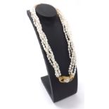 Freshwater pearl five strand necklace, the 18k yellow gold clasp set with diamonds and a single Mabé