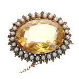 Victorian oval citrine, emerald and seed pearl cluster brooch, with safety chain, 21.4gm, 36mm x