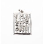 White gold diamond set pendant with Arabic script, 8.6gm, 23mm wide