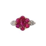 18k and platinum ruby and diamond floral cluster ring, with seven round-cut rubies with diamond