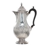 Late Victorian silver half fluted baluster coffee pot, with an ebonised hardwood handle, maker