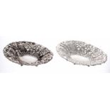 Pair of Victorian silver repousse and pierced oval baskets, maker Thomas Latham & Ernest Morton,