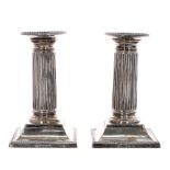 Pair of late Victorian small reeded silver candle sticks, maker William Hutton & Sons, London