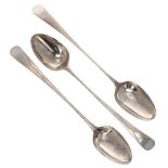 Pair of Georgian silver serving spoons, marked London 1797 and a further similar spoon with