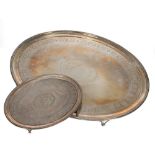 George III silver oval tray, raised on four feet, with engraved central shield and border, maker