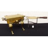 Early 19th century brass fire footman, with twin handles on cabriole front legs, 11.5" high, 19"