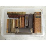 Small collection of leather bound books, mostly religious texts and includes a number of copies of